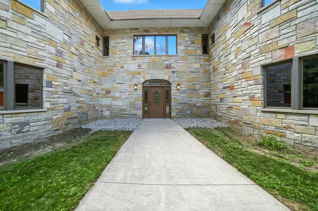 $995,000 | 2404 West 10 1/2 Mile Road, Irons, MI 49644