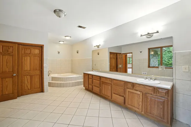 $995,000 | 2404 West 10 1/2 Mile Road, Irons, MI 49644