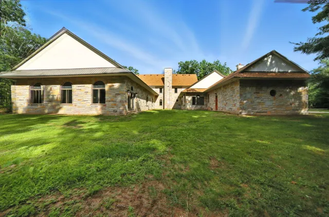 $995,000 | 2404 West 10 1/2 Mile Road, Irons, MI 49644