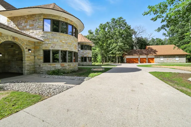 $995,000 | 2404 West 10 1/2 Mile Road, Irons, MI 49644