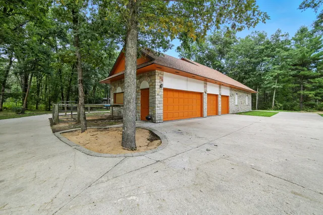 $995,000 | 2404 West 10 1/2 Mile Road, Irons, MI 49644