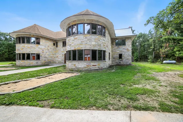 $995,000 | 2404 West 10 1/2 Mile Road, Irons, MI 49644