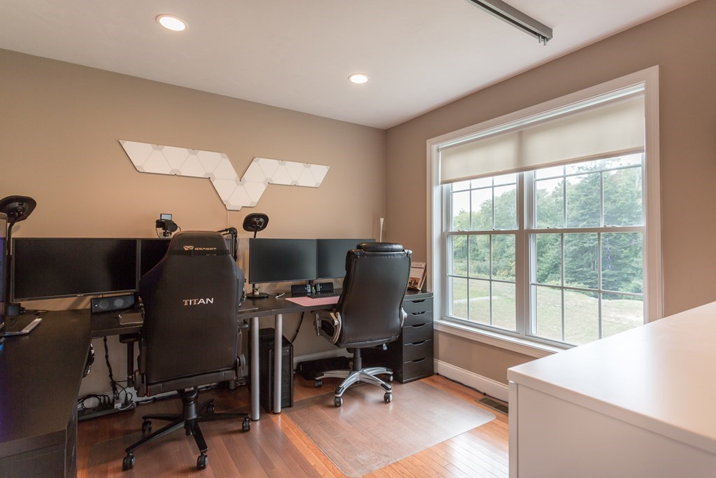 22 Highland Road, Unit 31 Raynham, MA 02767 - Photo 16 of 28 a view of a workspace with furniture and a window