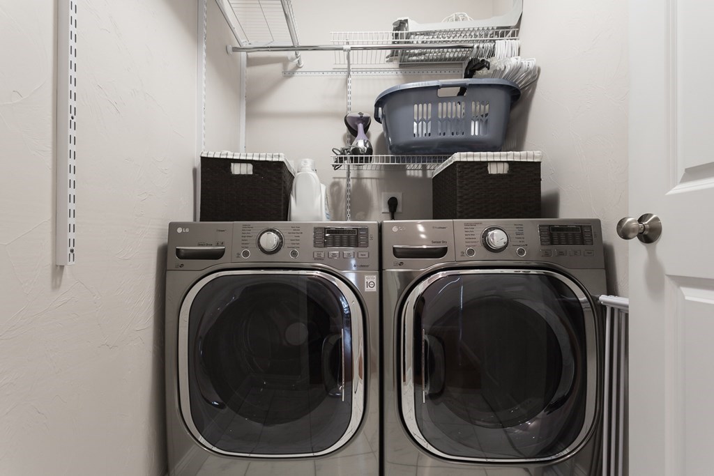22 Highland Road, Unit 31 Raynham, MA 02767 - Photo 18 of 28 a utility room with dryer and washer