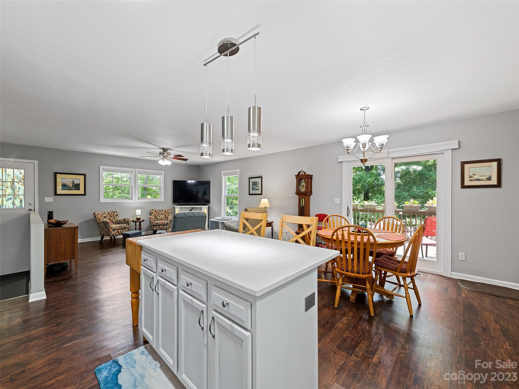 17 Secluded Trail Candler, NC 28715 - Photo 15 of 34 a view of a dining room with furniture window and wooden floor