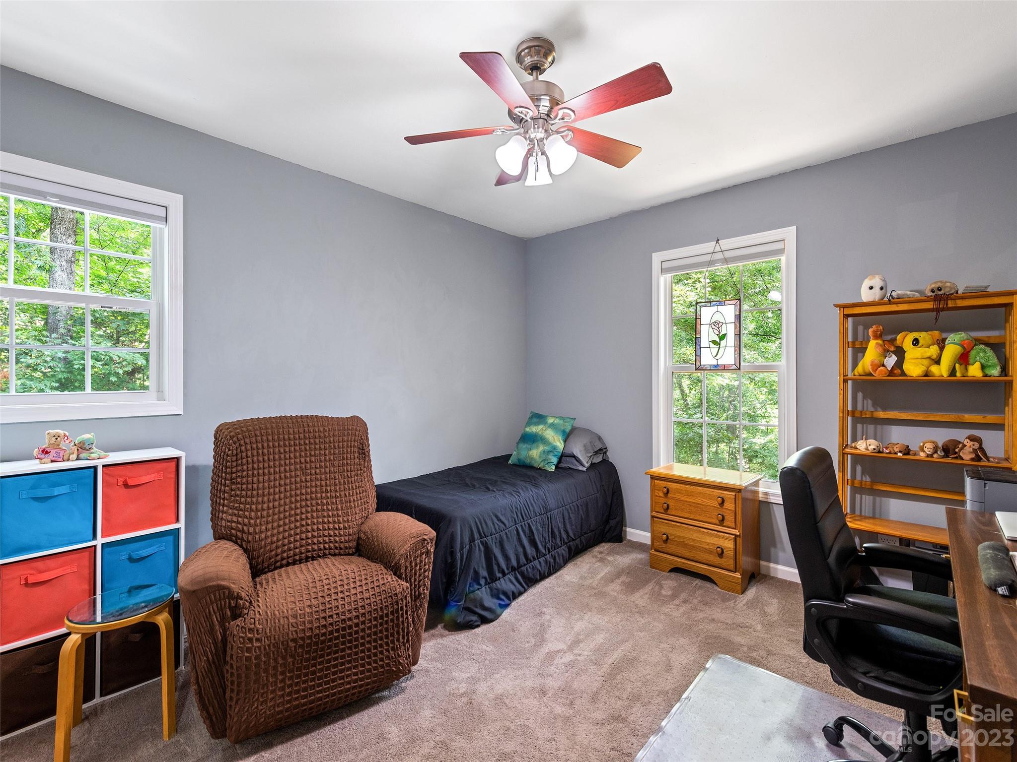 17 Secluded Trail Candler, NC 28715 - Photo 24 of 34 a bedroom with furniture and a window