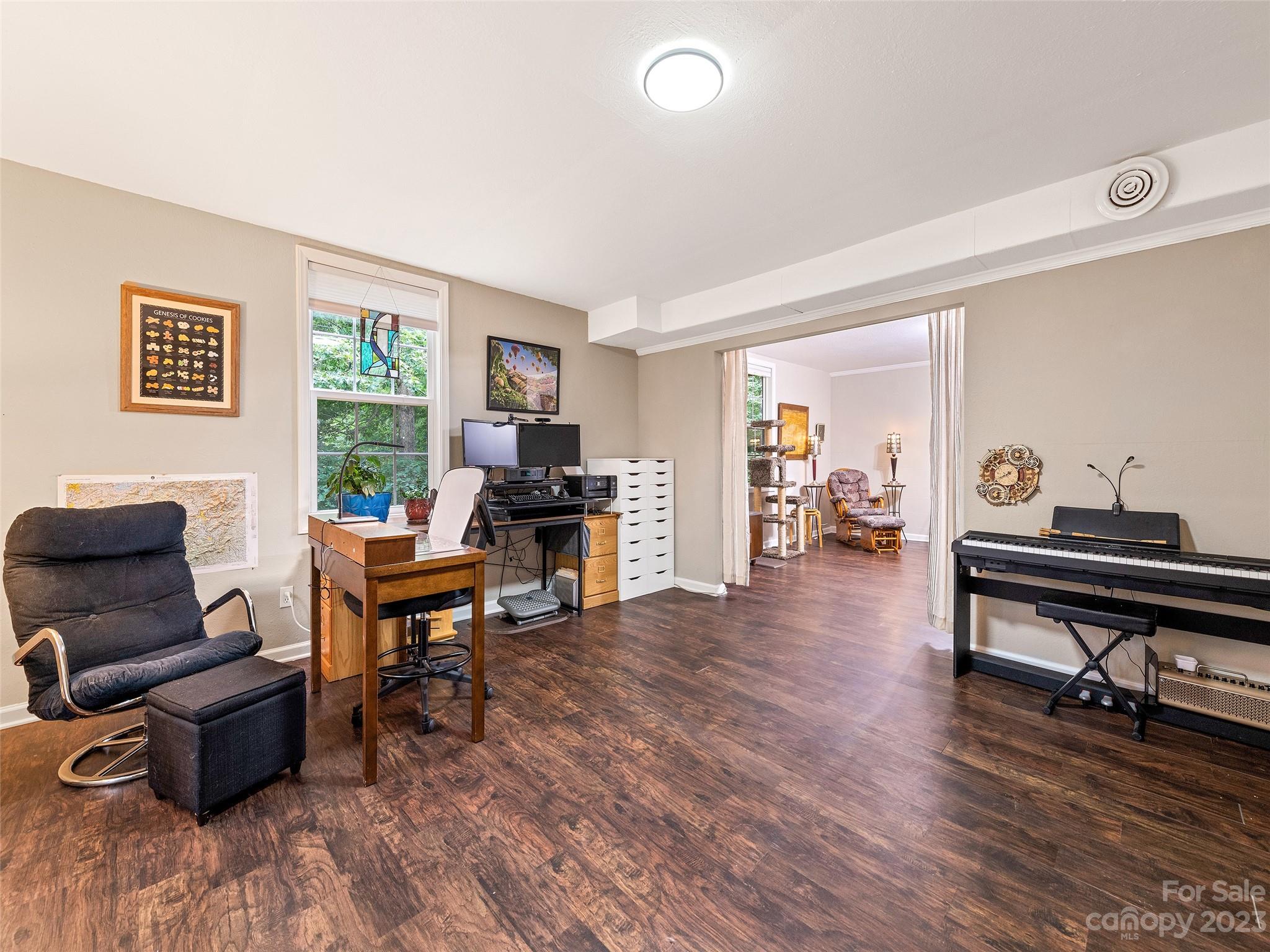 17 Secluded Trail Candler, NC 28715 - Photo 30 of 34 a living room with furniture and a wooden floor