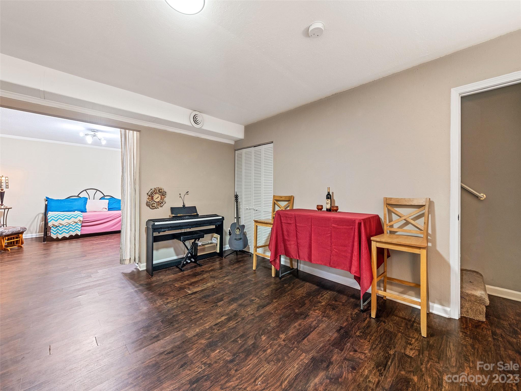 17 Secluded Trail Candler, NC 28715 - Photo 31 of 34 a living room with furniture and a wooden floor