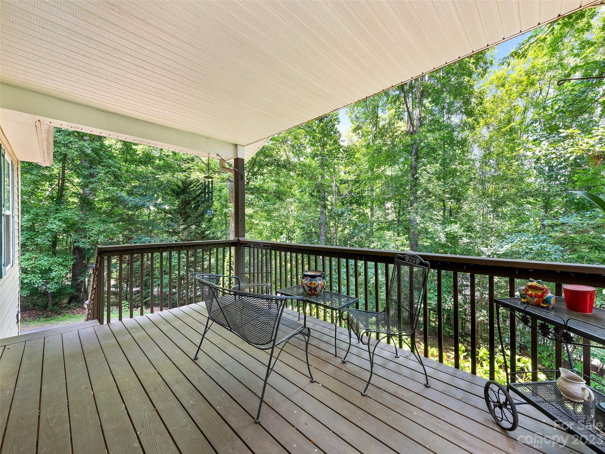 17 Secluded Trail Candler, NC 28715 - Photo 6 of 34 a view of balcony with wooden floor