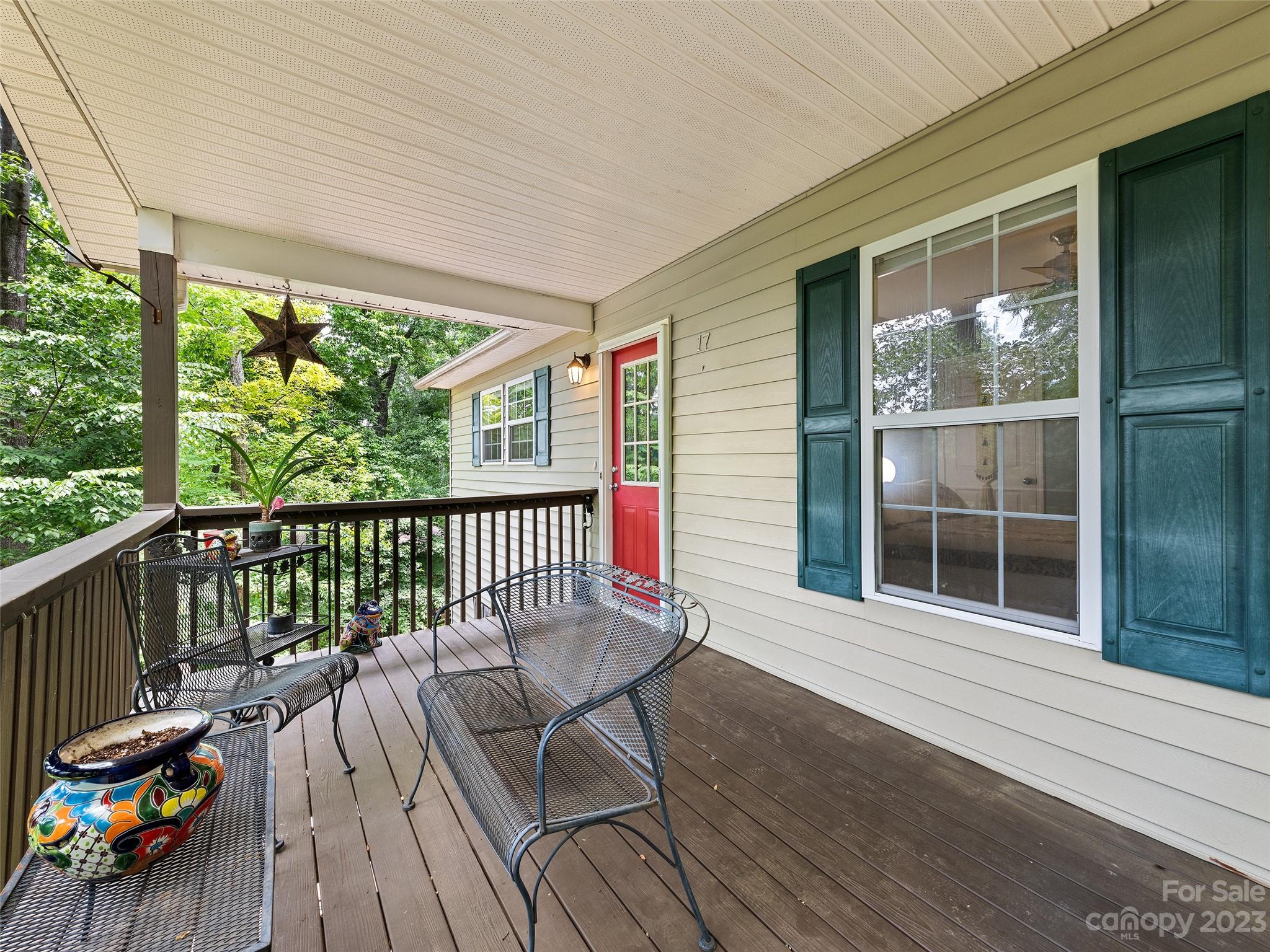 17 Secluded Trail Candler, NC 28715 - Photo 7 of 34 a view of a two chairs in the balcony
