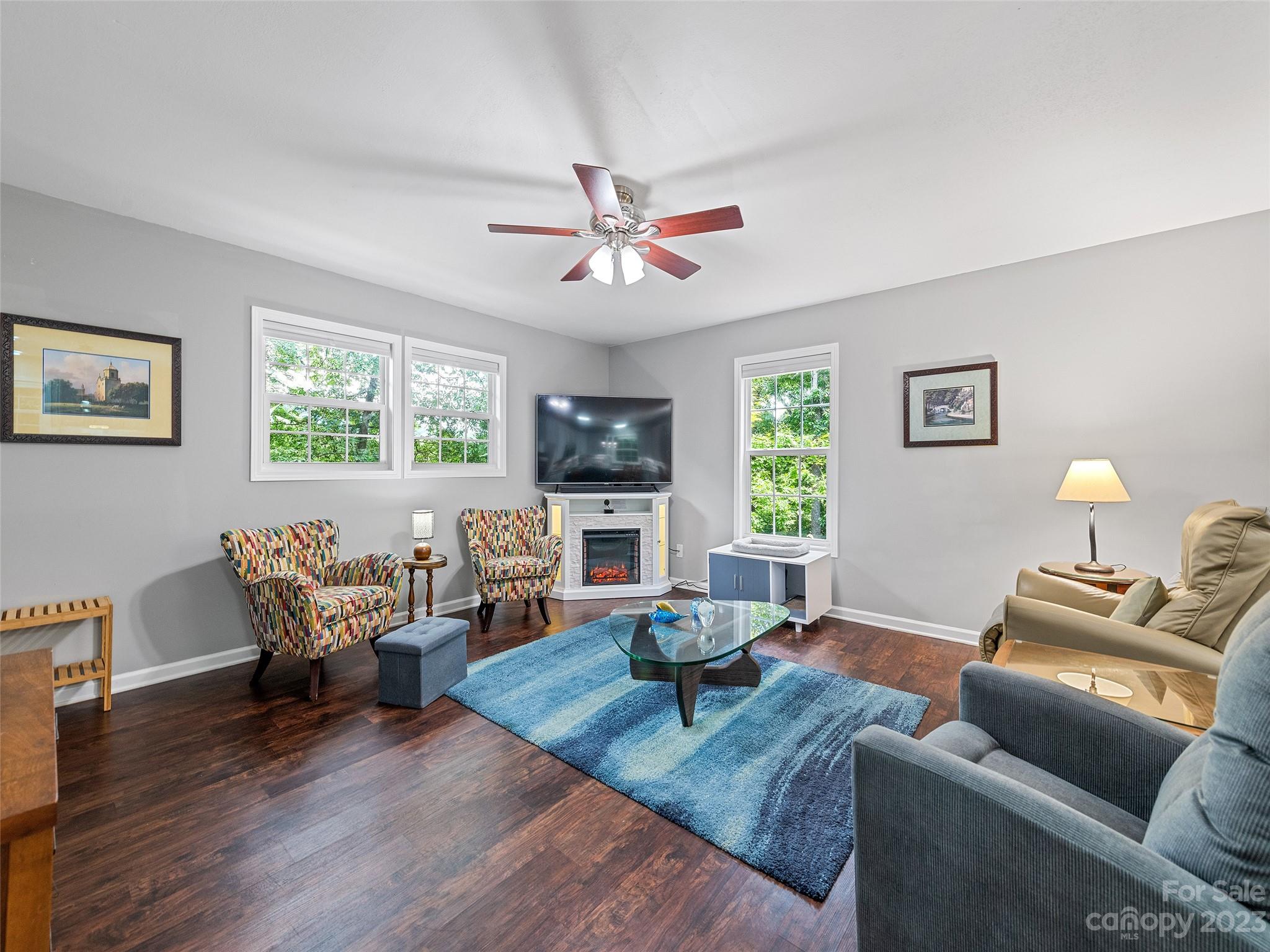 17 Secluded Trail Candler, NC 28715 - Photo 9 of 34 a living room with furniture and a wooden floor