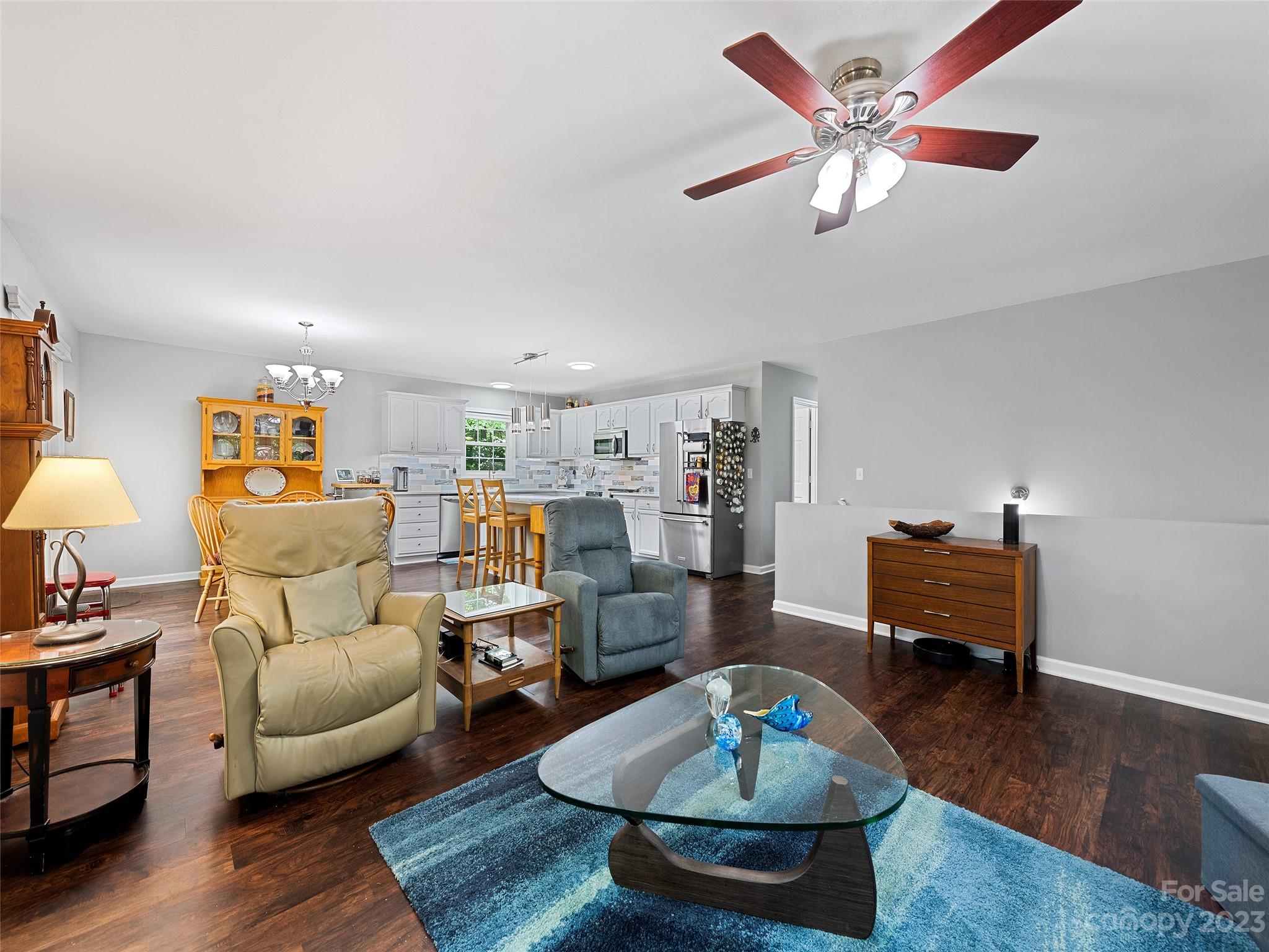 17 Secluded Trail Candler, NC 28715 - Photo 10 of 34 a living room with furniture and a wooden floor
