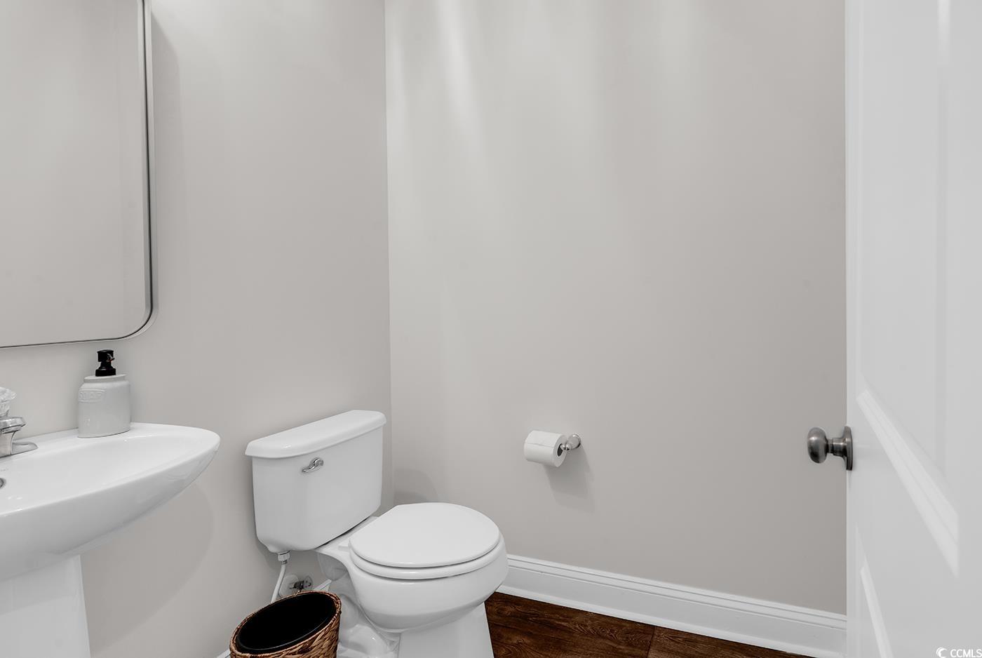 535 Chanted Drive Murrells Inlet, SC 29576 - Photo 12 of 37 Bathroom with toilet and dark wood-style flooring