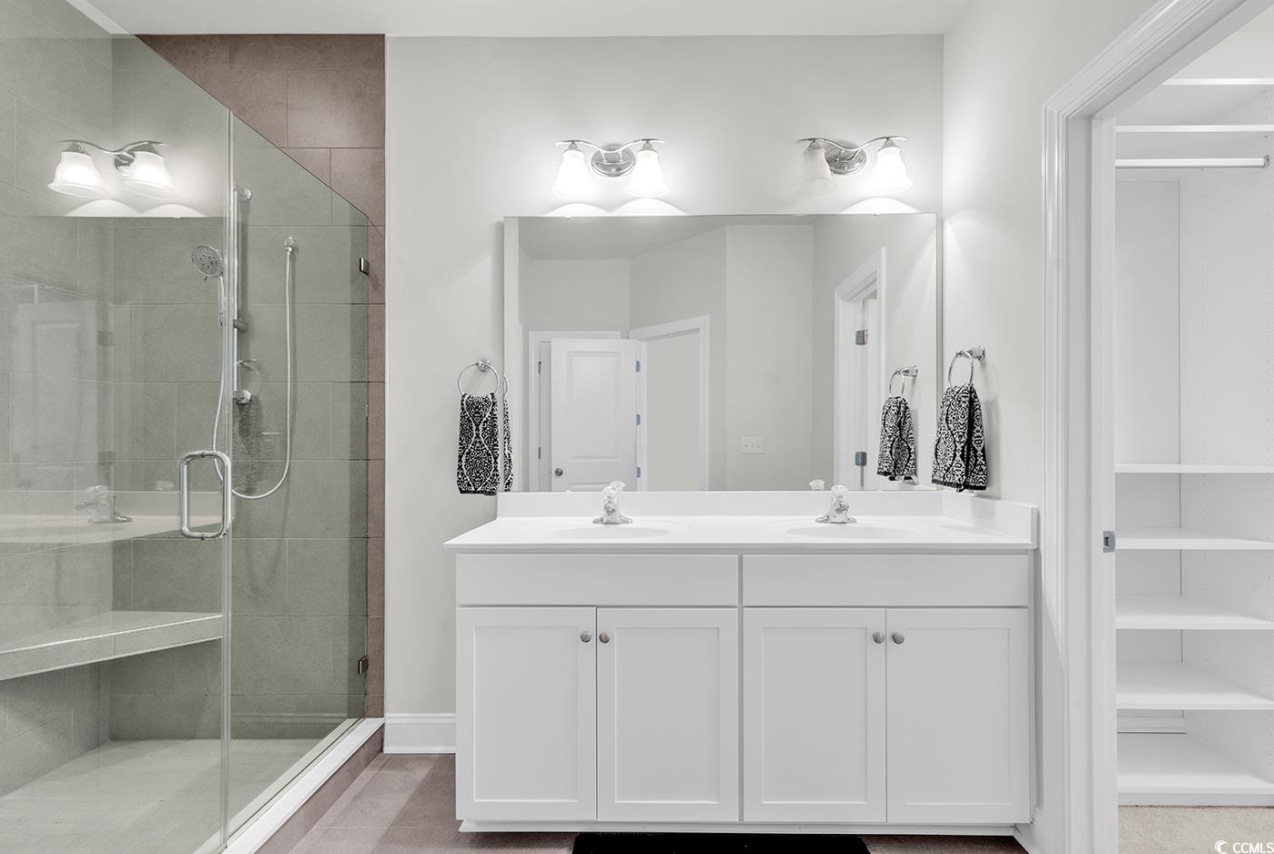 535 Chanted Drive Murrells Inlet, SC 29576 - Photo 16 of 37 Full bath featuring double vanity and a shower stall