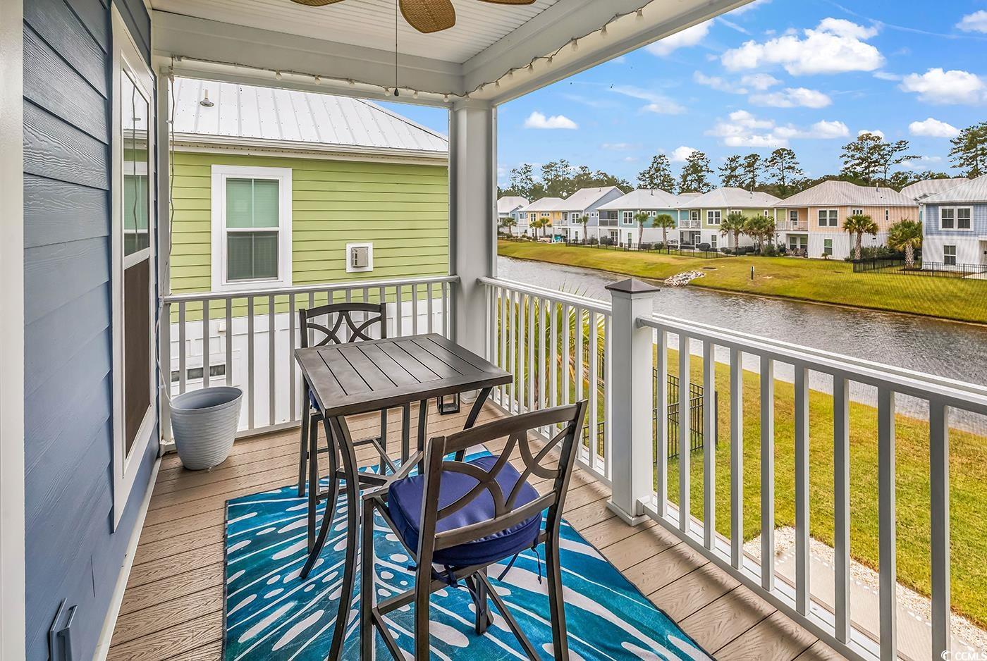 535 Chanted Drive Murrells Inlet, SC 29576 - Photo 19 of 37 Balcony featuring a water view and a ceiling fan