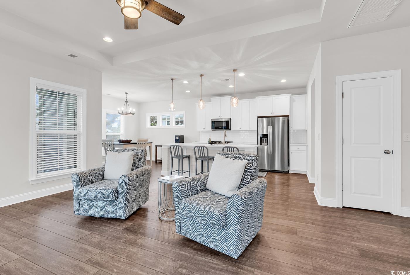 535 Chanted Drive Murrells Inlet, SC 29576 - Photo 4 of 37 Living room with recessed lighting, dark wood-type flooring, a chandelier, and a ceiling fan