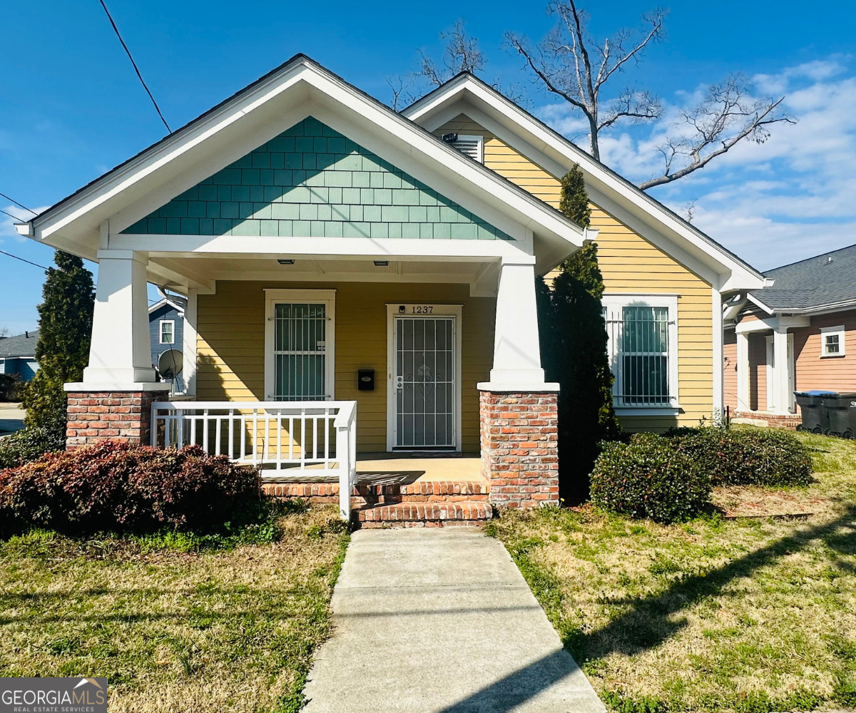 1237 11th Street Augusta, GA 30901 - Photo 1 of 1 a front view of a house with yard