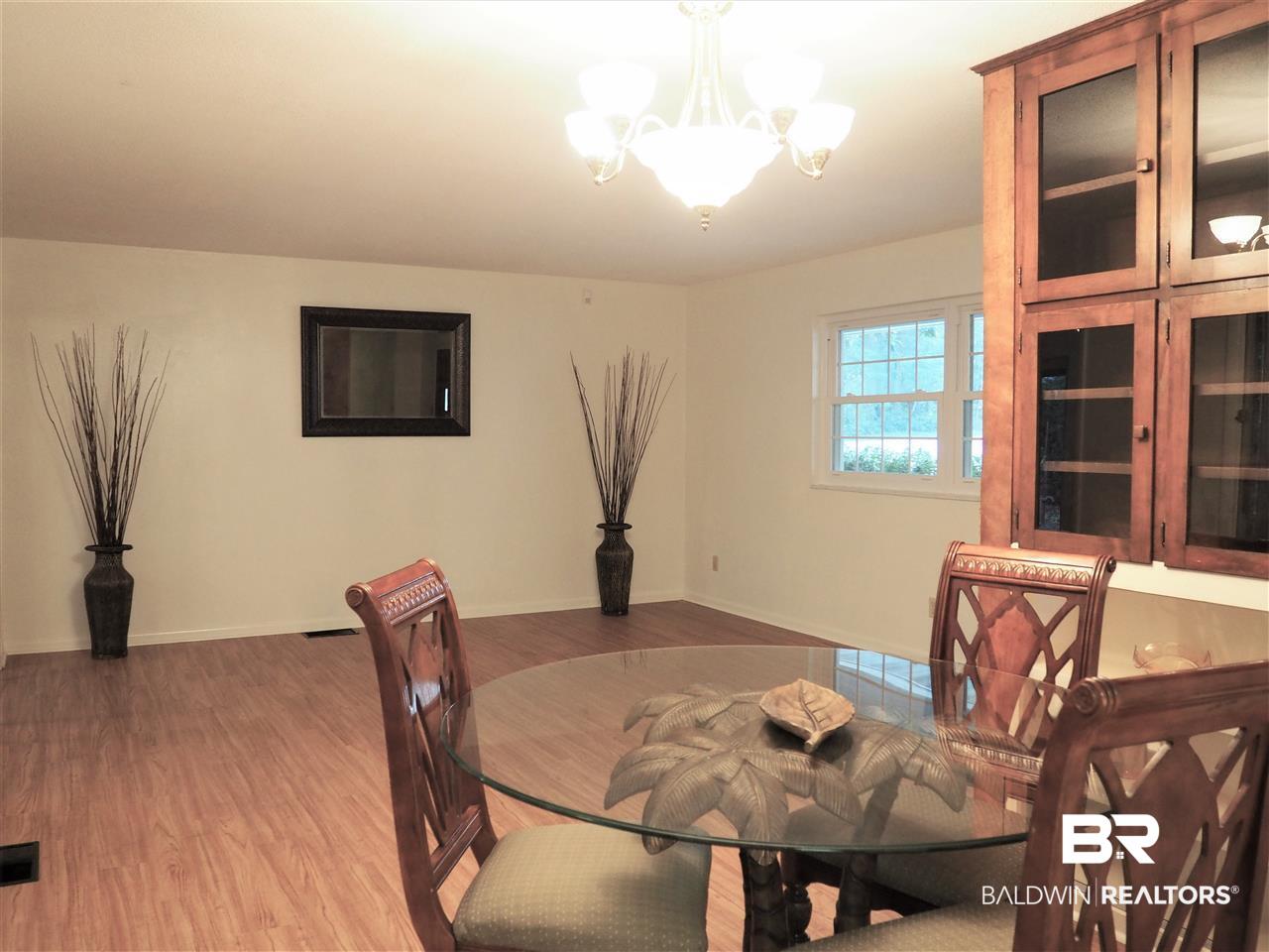 33420 Helms Lane Lillian, AL 36549 - Photo 22 of 35 Dining room Living room