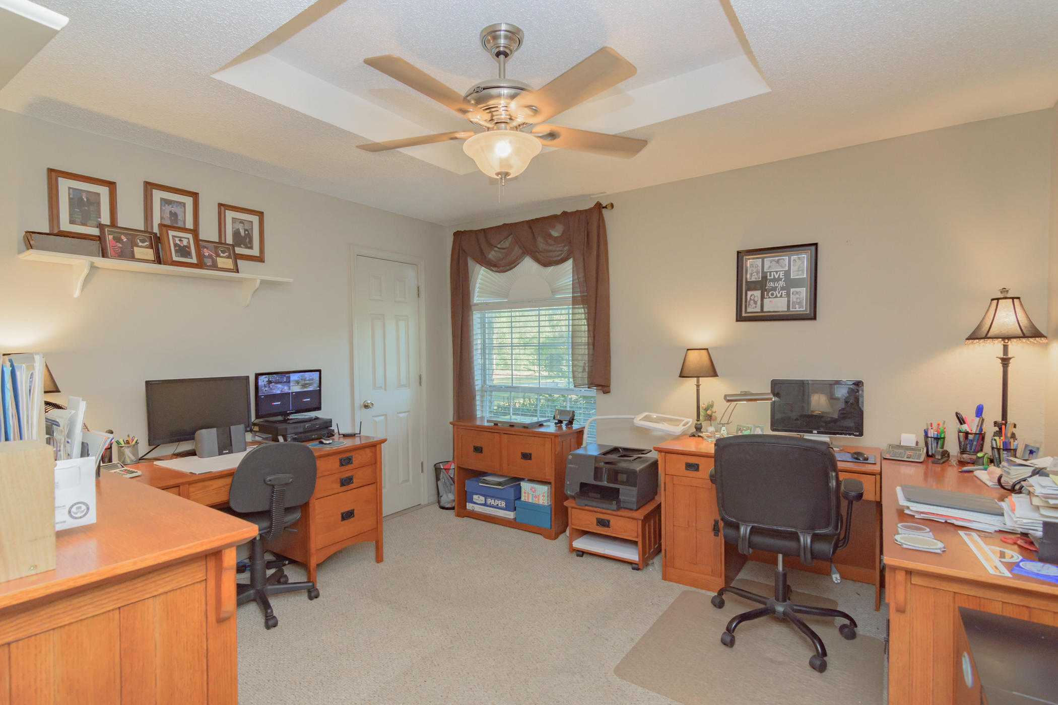 7262 Old River Road Baker, FL 32531 - Photo 14 of 63 a view of a workspace with workspace and a window