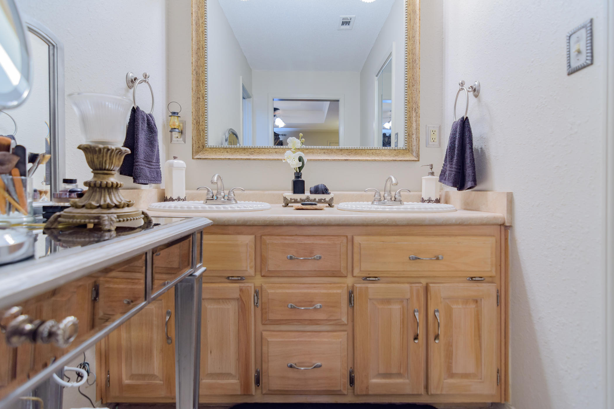 7262 Old River Road Baker, FL 32531 - Photo 24 of 63 a bathroom with a sink vanity and a mirror