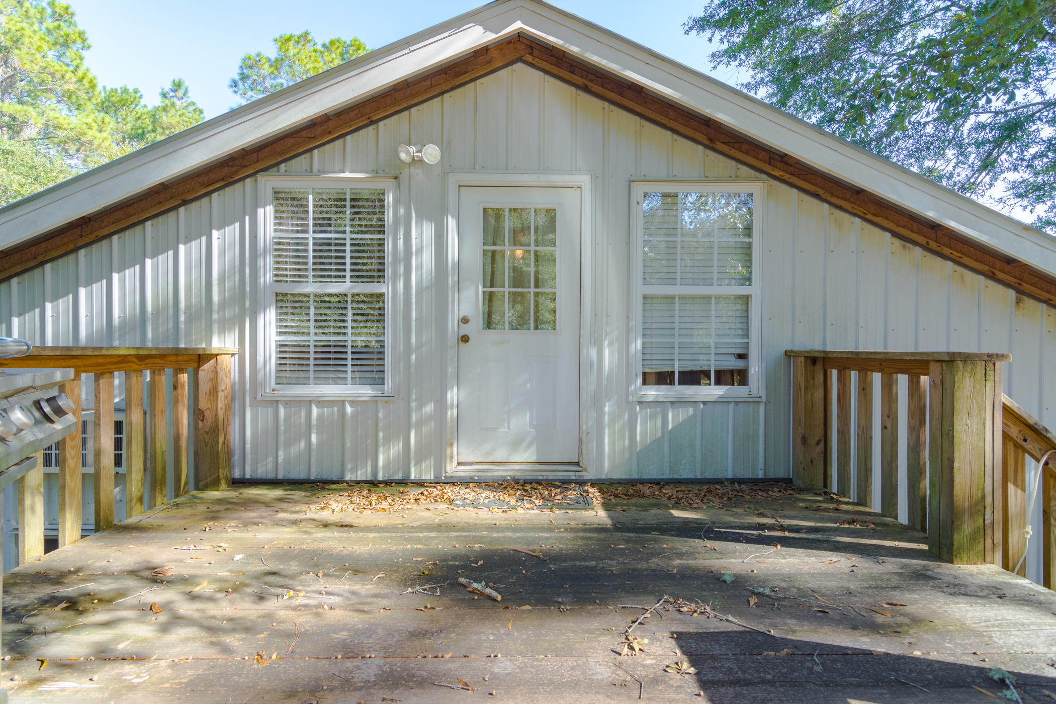 7262 Old River Road Baker, FL 32531 - Photo 37 of 63 a front view of a house with a yard