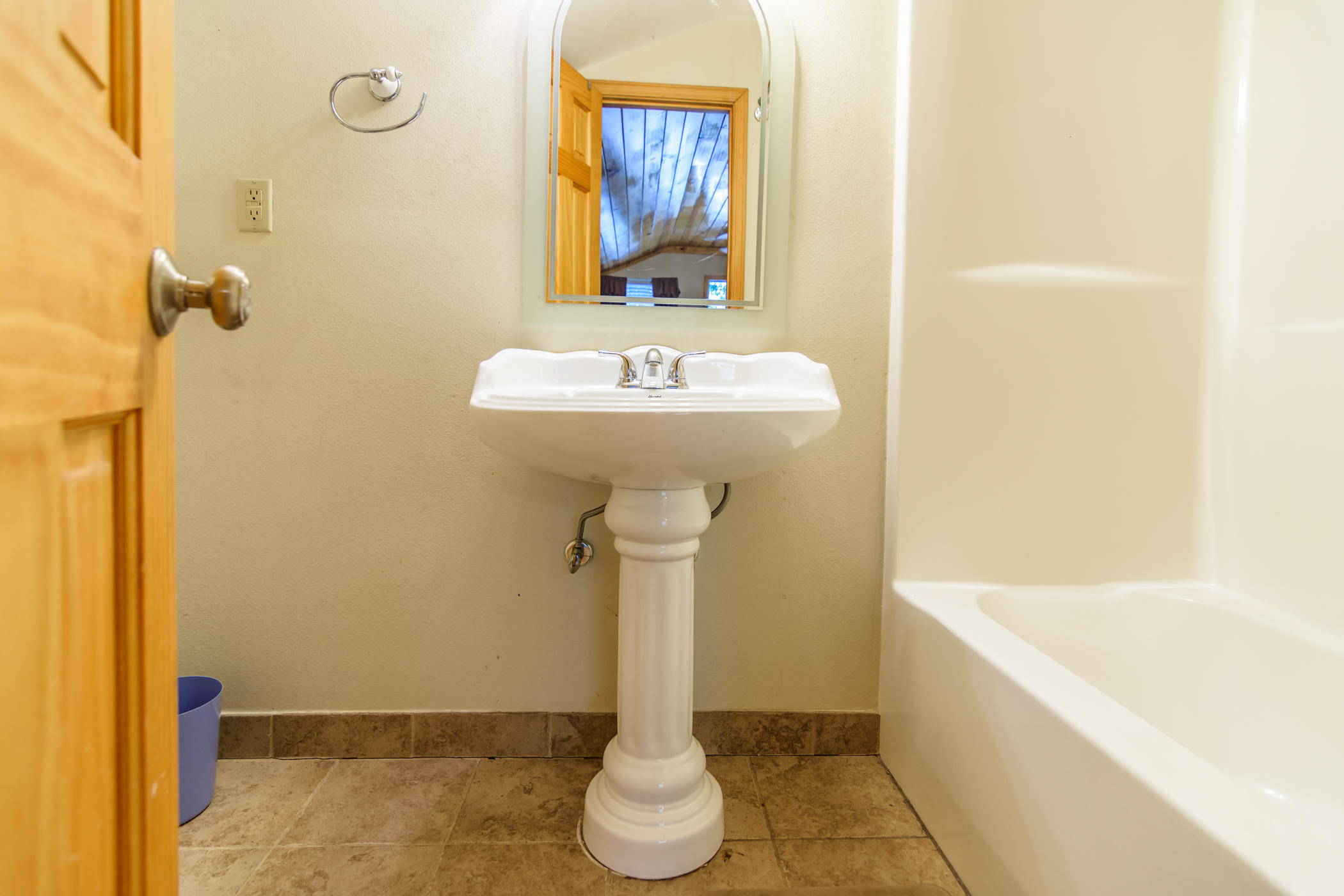 7262 Old River Road Baker, FL 32531 - Photo 40 of 63 a bathroom with a sink and a bathtub