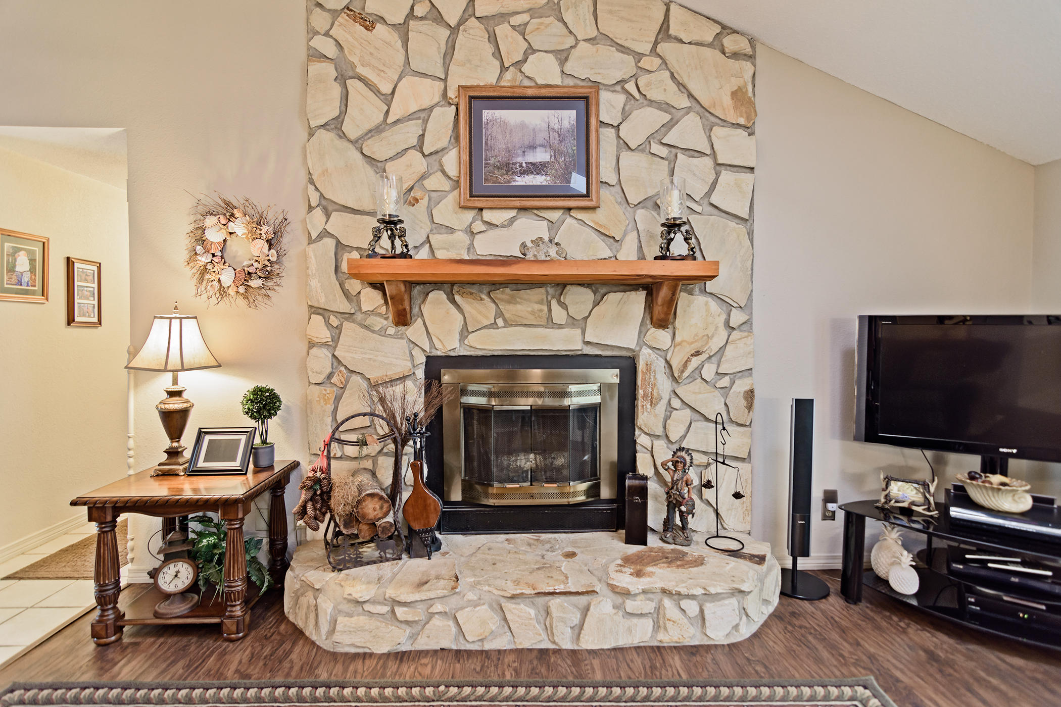 7262 Old River Road Baker, FL 32531 - Photo 5 of 63 a living room with furniture and a fireplace