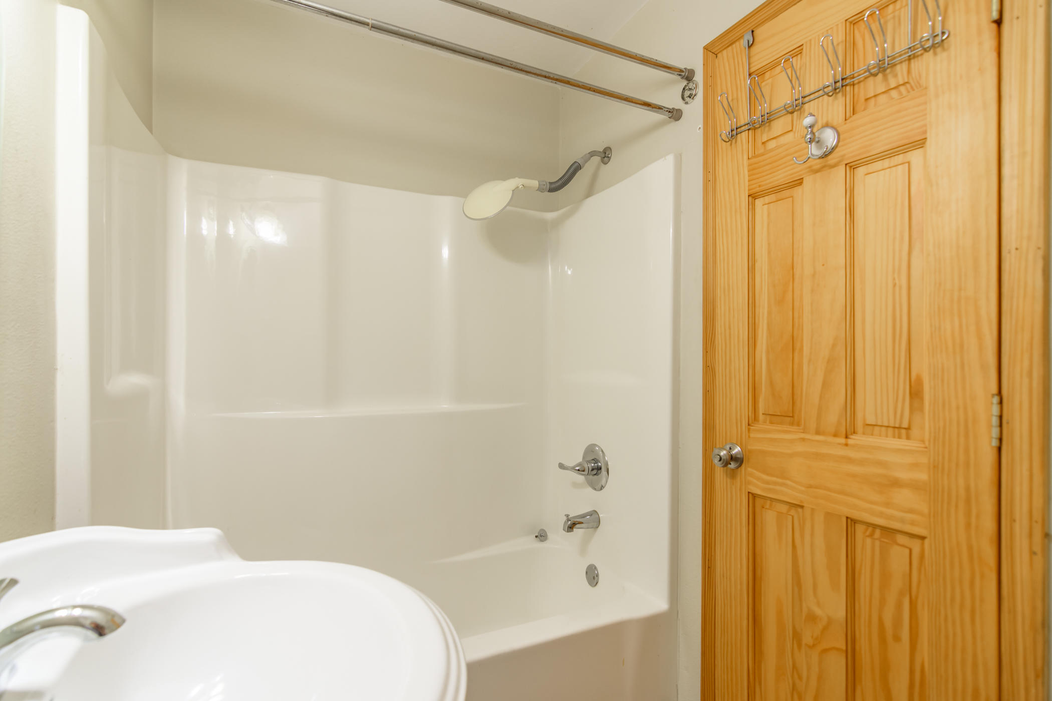 7262 Old River Road Baker, FL 32531 - Photo 41 of 63 a bathroom with a bathtub and a shower