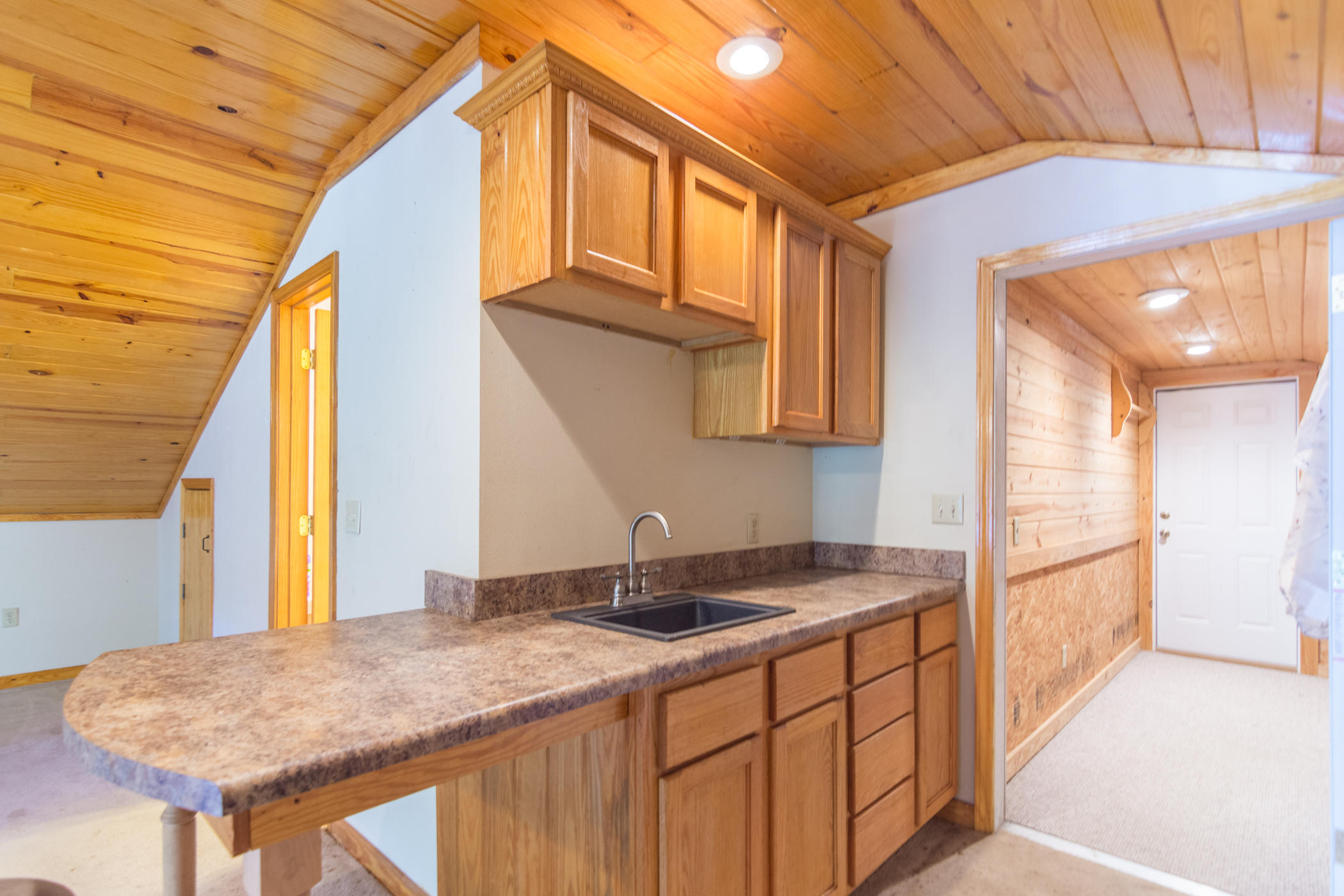7262 Old River Road Baker, FL 32531 - Photo 42 of 63 a kitchen with sink and cabinets