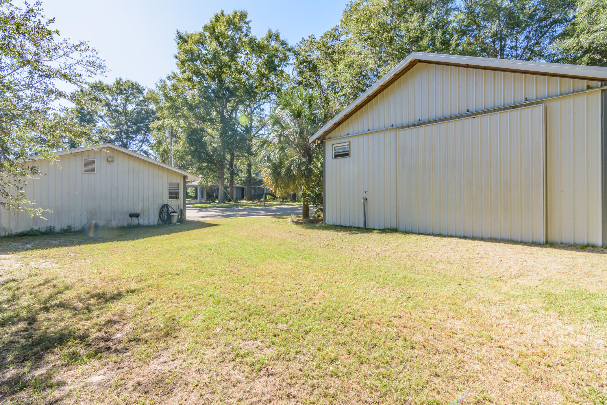 7262 Old River Road Baker, FL 32531 - Photo 48 of 63 a house view with a backyard space