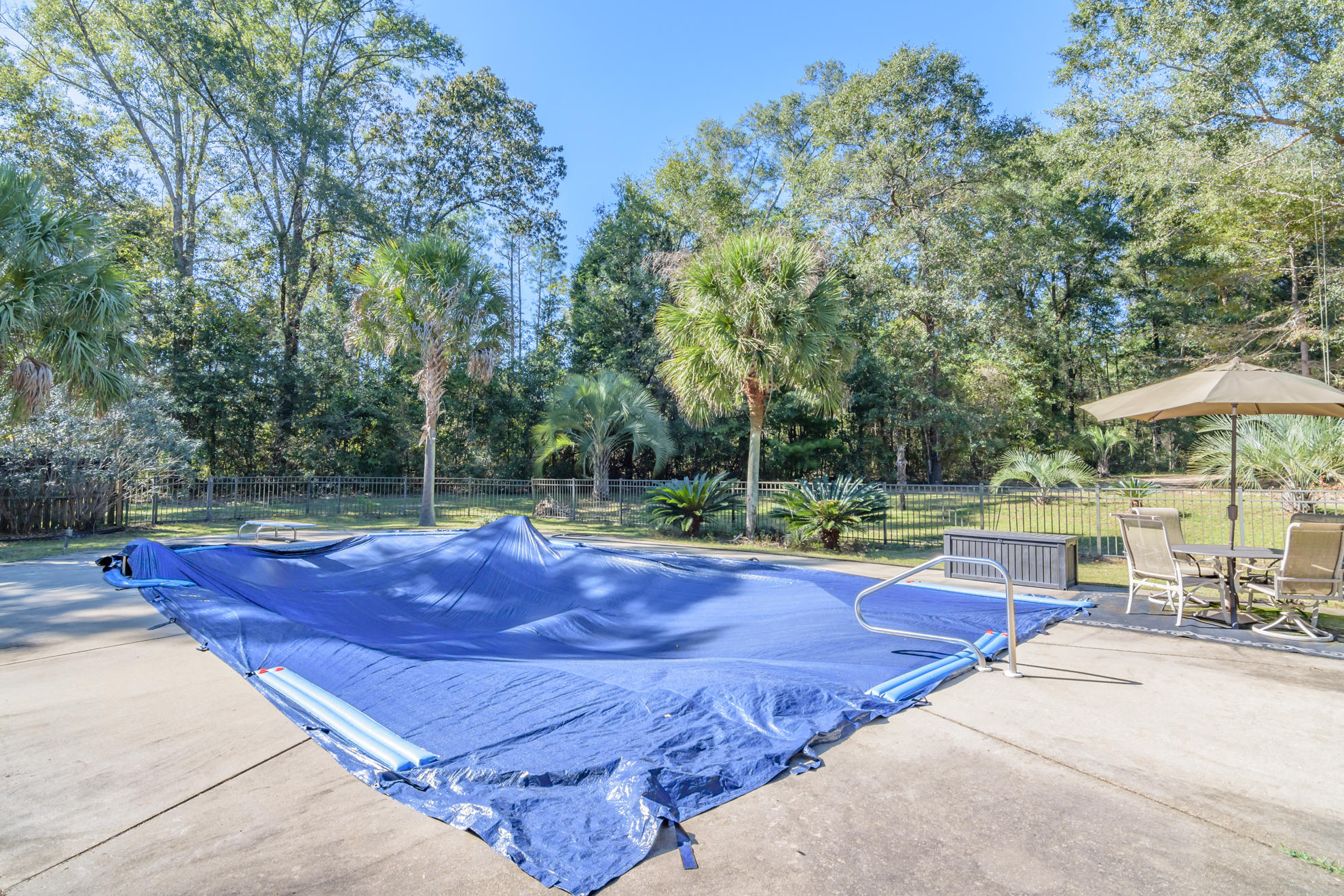 7262 Old River Road Baker, FL 32531 - Photo 49 of 63 a view of a tennis court