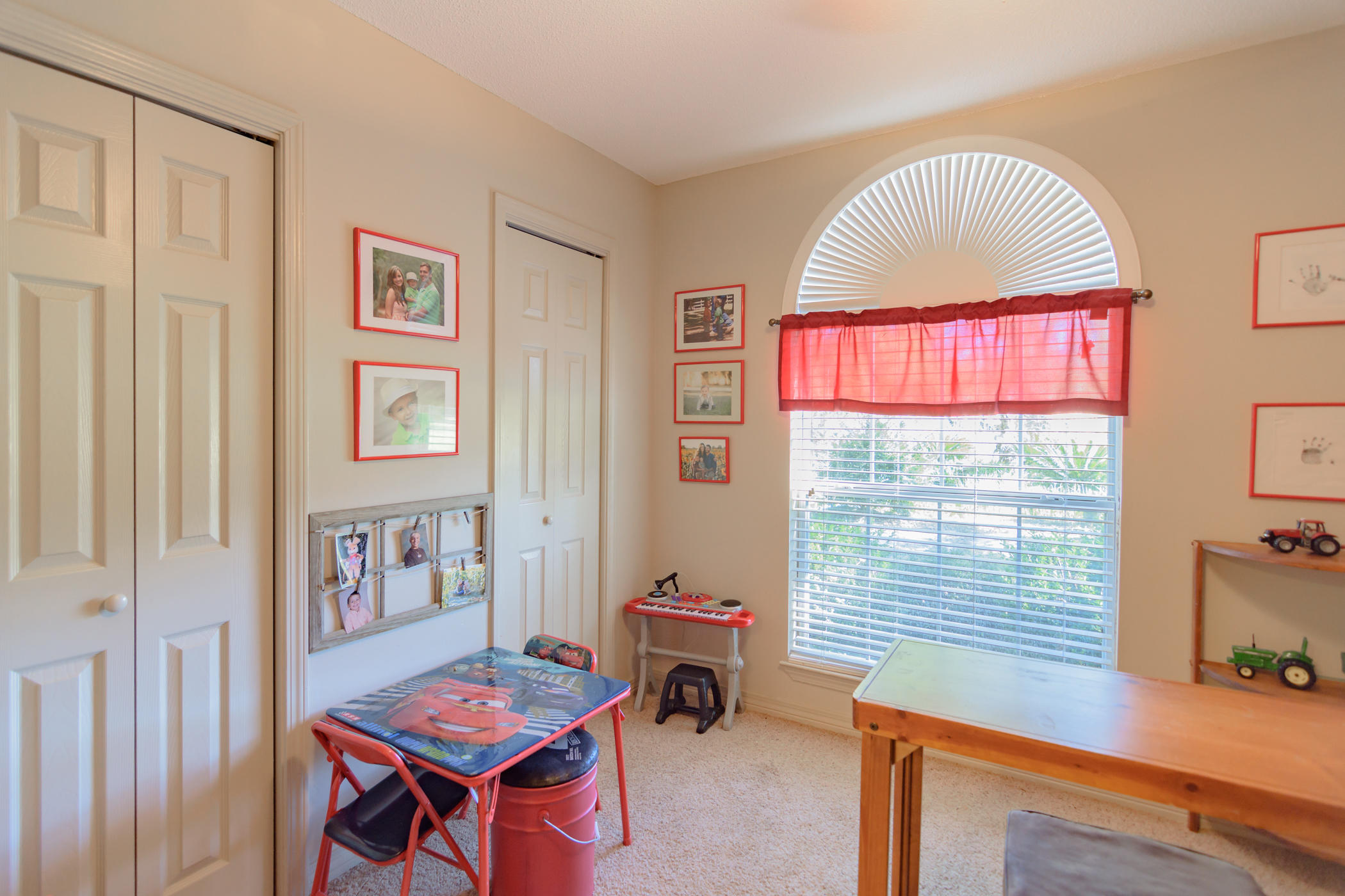 7262 Old River Road Baker, FL 32531 - Photo 8 of 63 a living room with furniture and a window