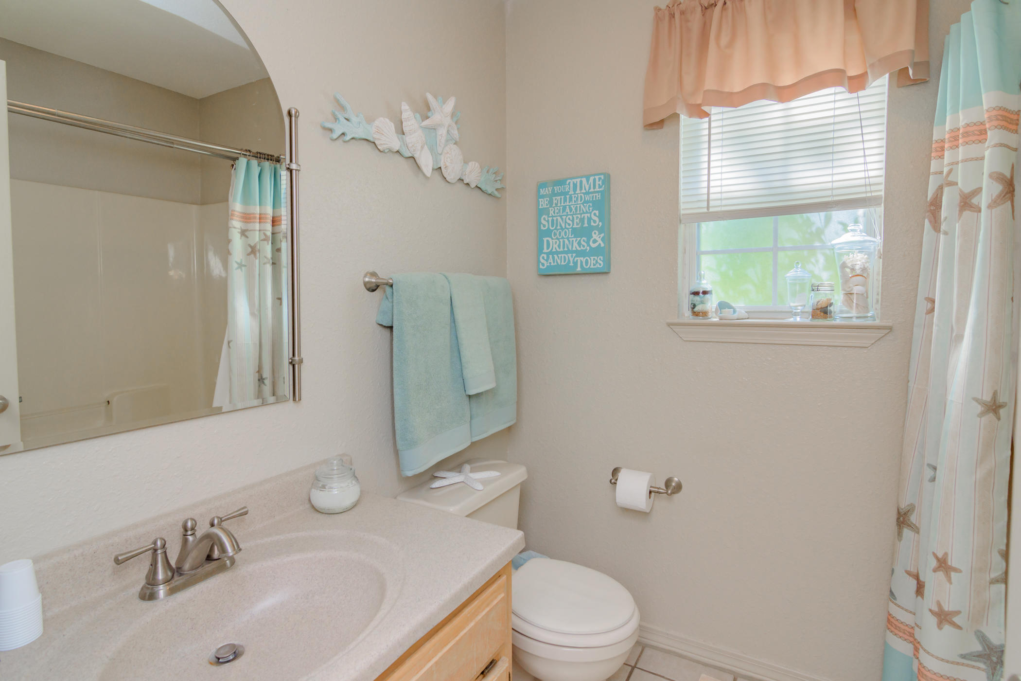 7262 Old River Road Baker, FL 32531 - Photo 9 of 63 a bathroom with a sink toilet and shower