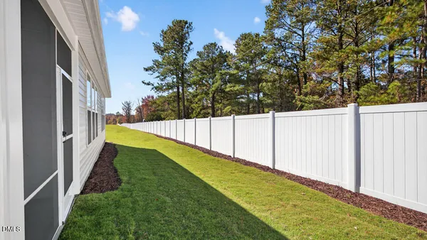 a view of back yard of the house