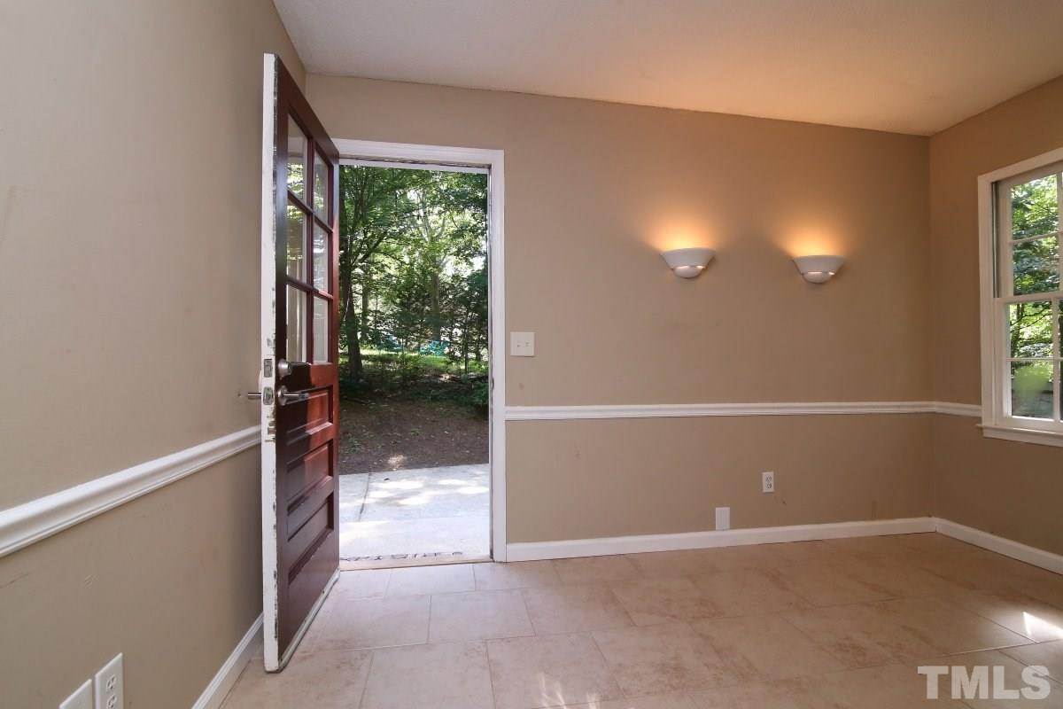 7700 Greentree Court Raleigh, NC 27615 - Photo 13 of 25 a view of an empty room with window