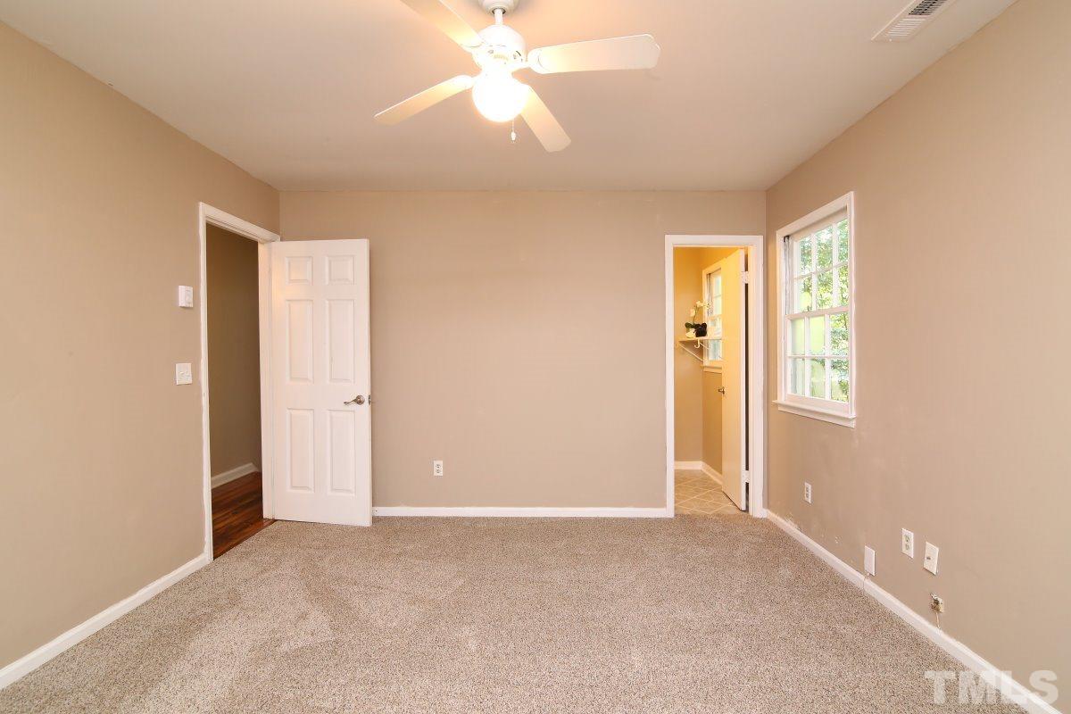 7700 Greentree Court Raleigh, NC 27615 - Photo 17 of 25 a view of an empty room with a window
