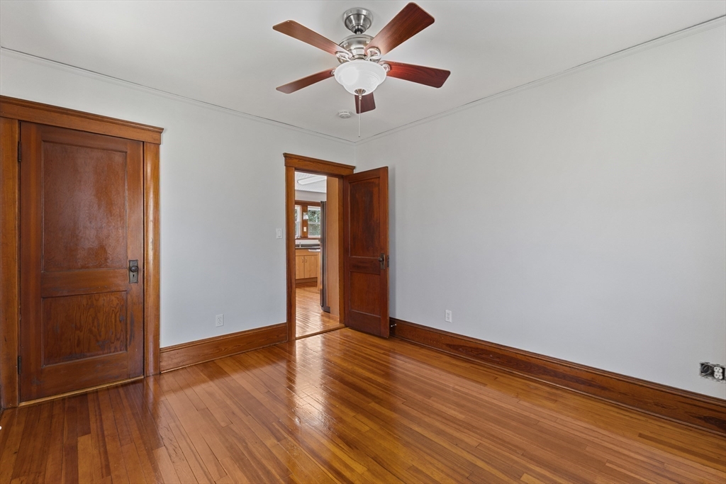 183 Pleasant Street, Unit 2 Grafton, MA 01560 - Photo 14 of 34 a view of an empty room with wooden floor