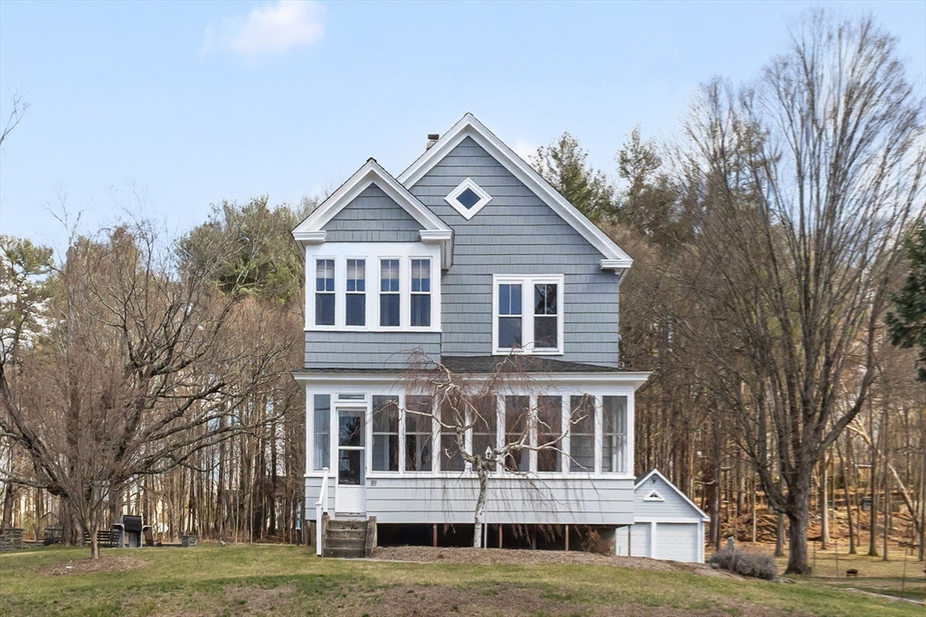 183 Pleasant Street, Unit 2 Grafton, MA 01560 - Photo 25 of 34 a house view with garden space