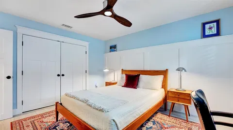 a kitchen with a sink a stove cabinets and counter space