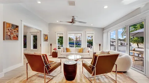 a living room with furniture and a gate