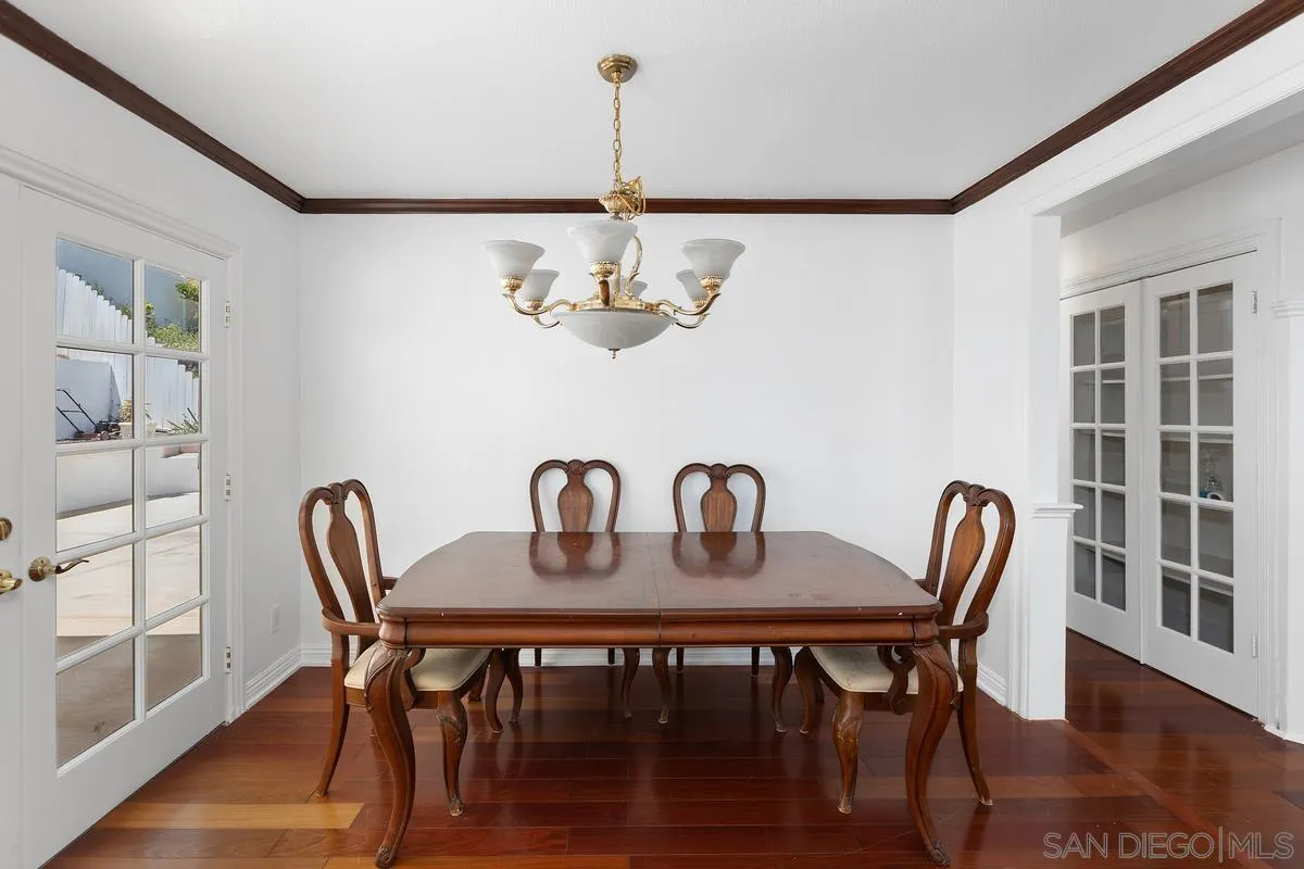 13749 Avenida Del Charro El Cajon, CA 92021 - Photo 11 of 24 a view of a dining room with furniture window and wooden floor