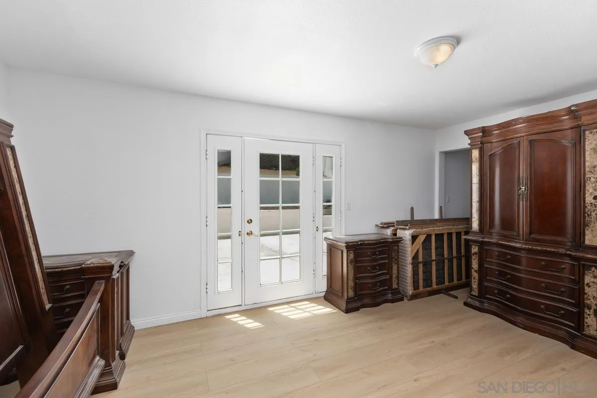 13749 Avenida Del Charro El Cajon, CA 92021 - Photo 16 of 24 a view of livingroom with furniture and windows