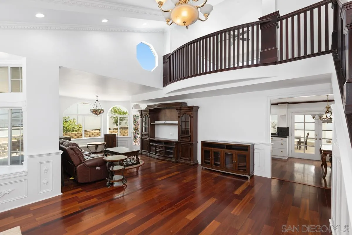 13749 Avenida Del Charro El Cajon, CA 92021 - Photo 4 of 24 a living room with furniture or wooden floor and a fireplace