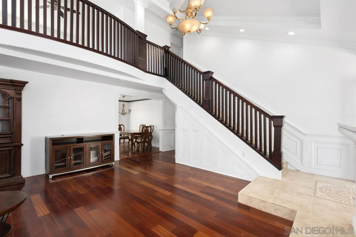 13749 Avenida Del Charro El Cajon, CA 92021 - Photo 5 of 24 a view of a livingroom with furniture hardwood floor and staircase