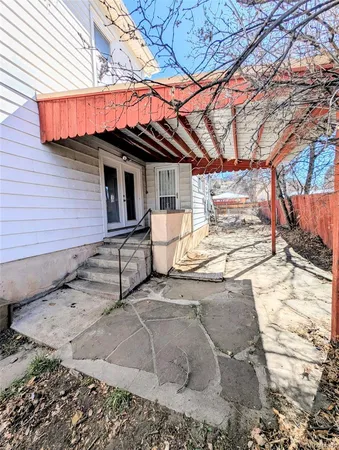 a view of a house with a patio