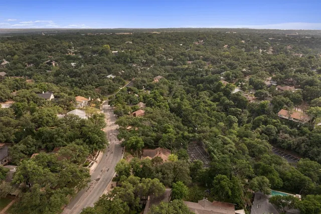 a view of city and green space