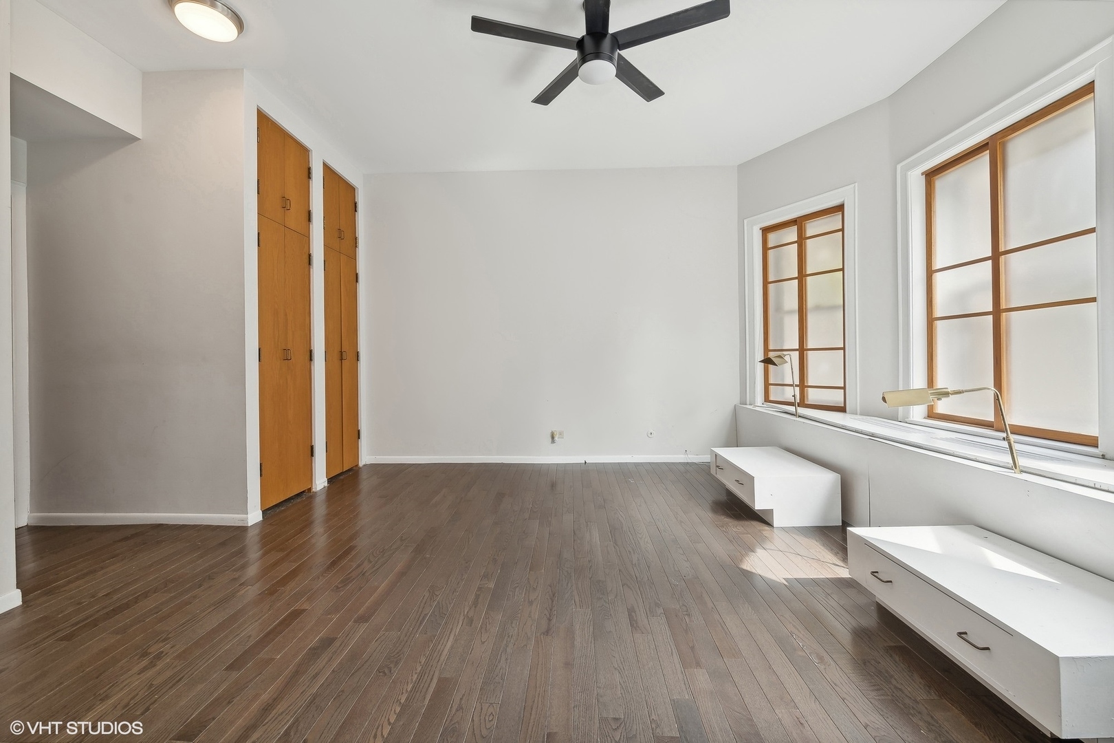 700 West Irving Park Road, Unit A1 Chicago, IL 60613 - Photo 11 of 20 a view of a room with wooden floor and window