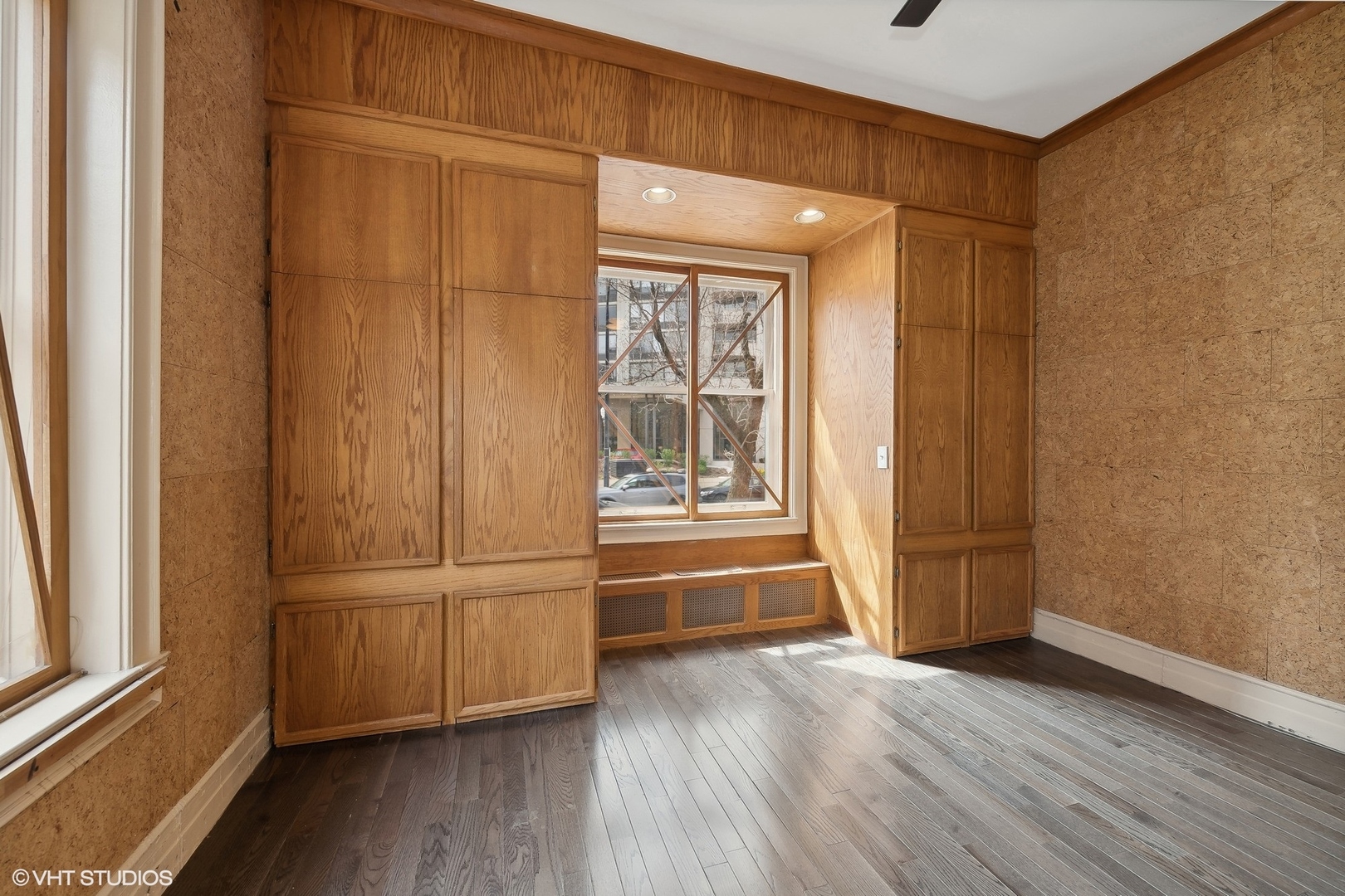 700 West Irving Park Road, Unit A1 Chicago, IL 60613 - Photo 15 of 20 a view of empty room with wooden floor and fan