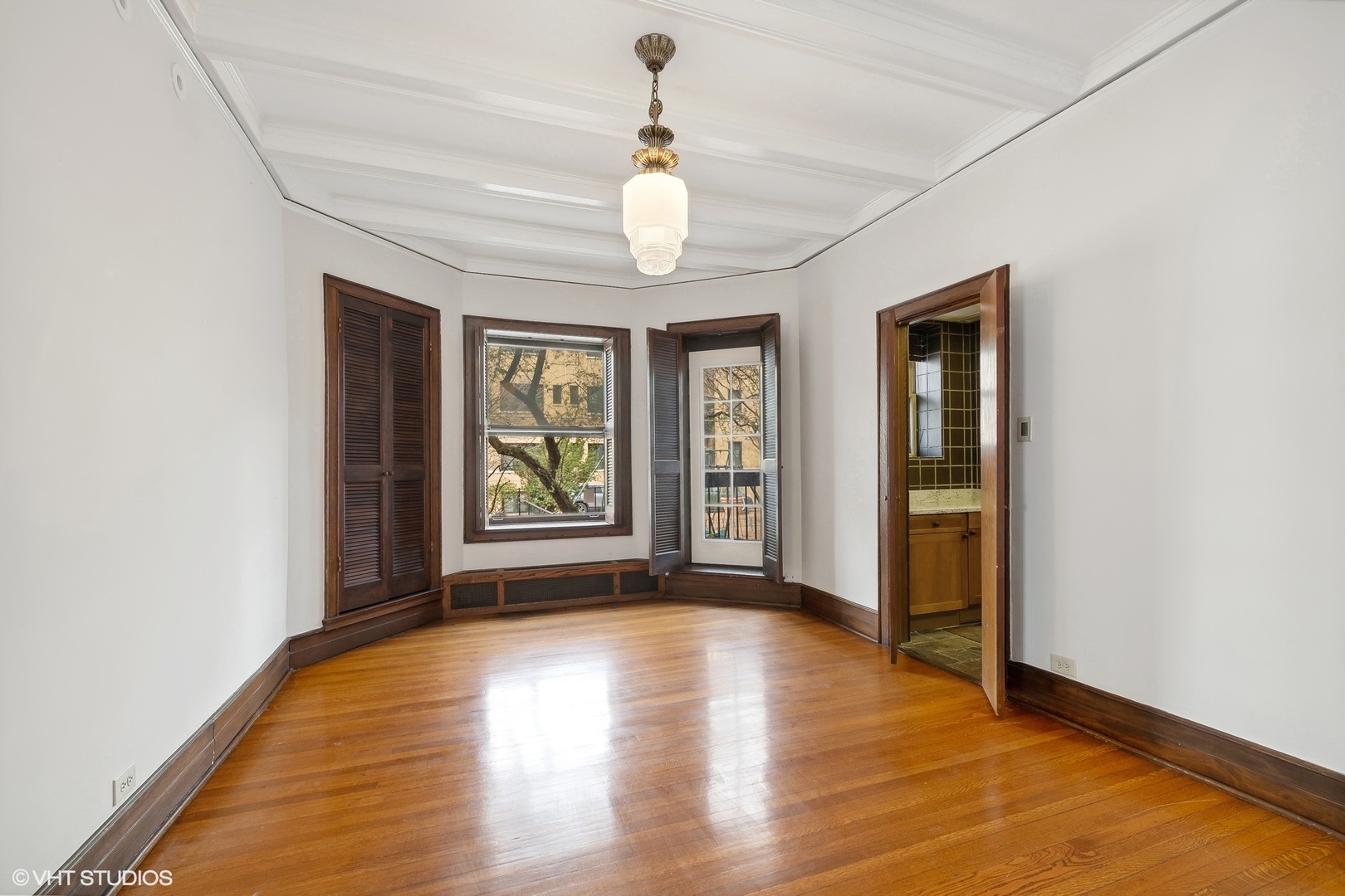700 West Irving Park Road, Unit A1 Chicago, IL 60613 - Photo 5 of 20 a view of an empty room with a window
