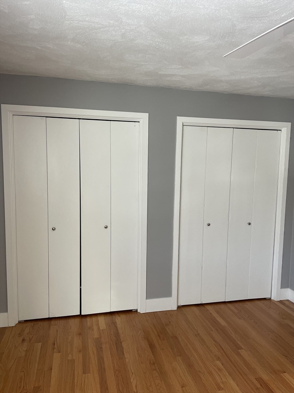 31 Blithewood Avenue, Unit 705 Worcester, MA 01604 - Photo 15 of 31 a view of an empty room with wooden floor